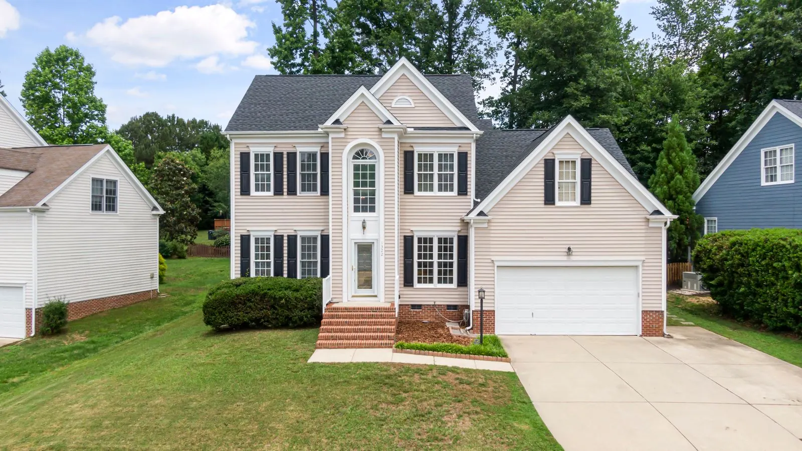 Two story North Carolina home with a durable dark roof