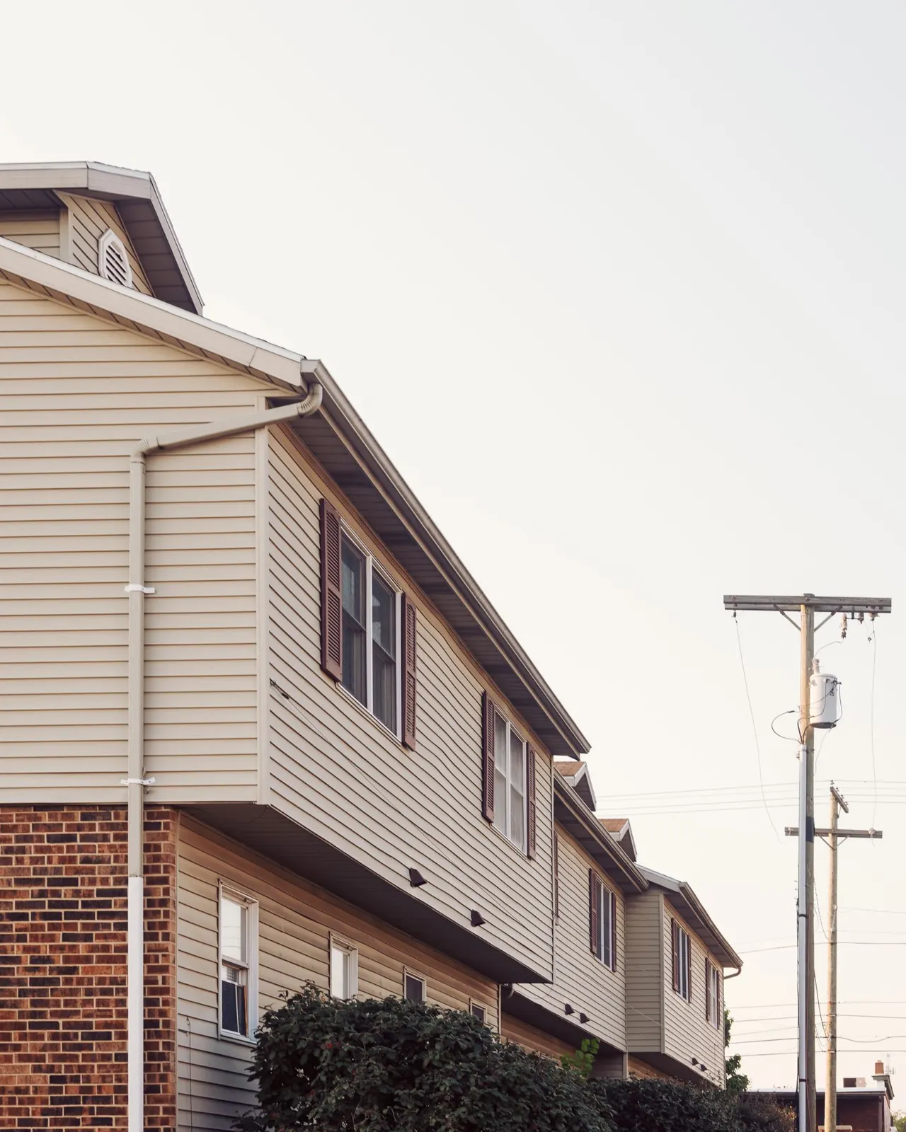 Townhouse siding with gutter and downspout detail